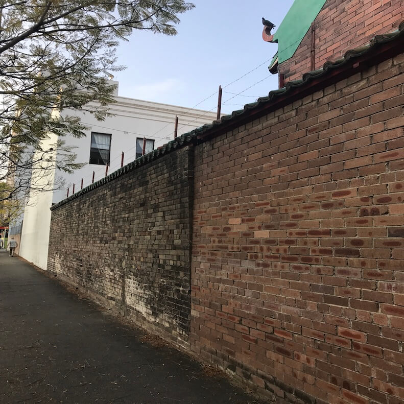 repair leaning brick wall