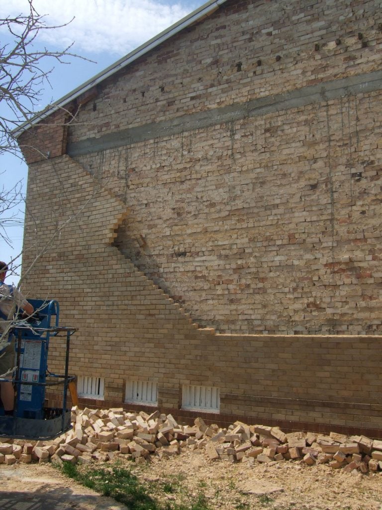 collapsed brick wall