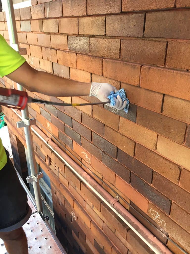 inserting resin cavity wall ties