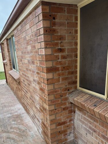 Bricks carefully replaced - Mortar matched still curing 