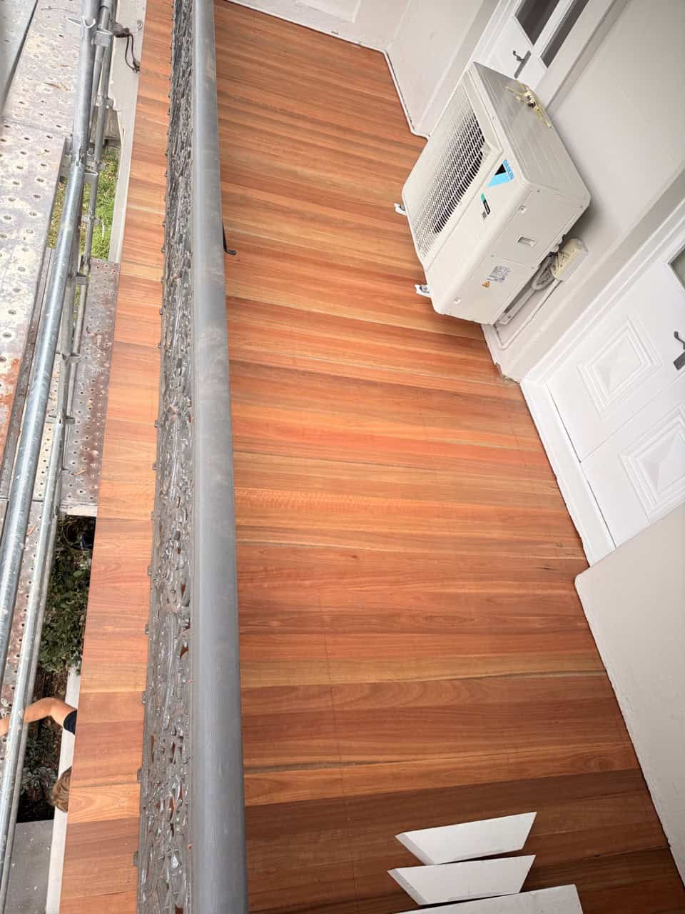 Hardwood flooring close-up: Hardwood balcony flooring installed during heritage terrace restoration